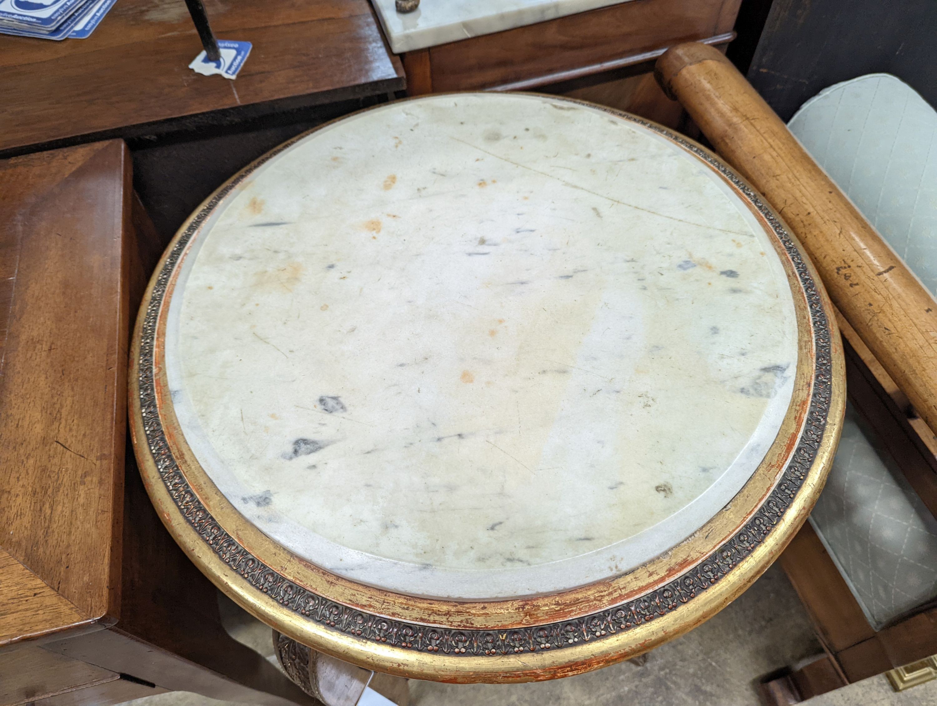 A French caned giltwood circular centre table with reconstituted marble top, diameter 55cm, height 76cm